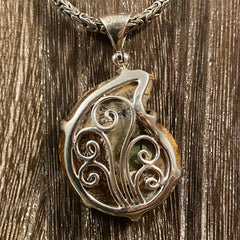 Ammonite Pendant with Mother of Pearl Inlay Ammonite Pendant with Mother of Pearl Inlay